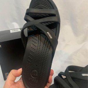 CROCS woman’s size 9. Slip on sandals. Brand new! NWOT. black.